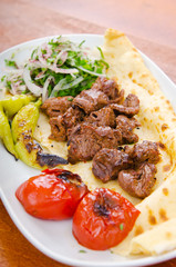 Kebab served in the plate