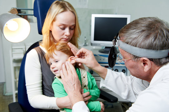 Medical otitus examination of child doctor