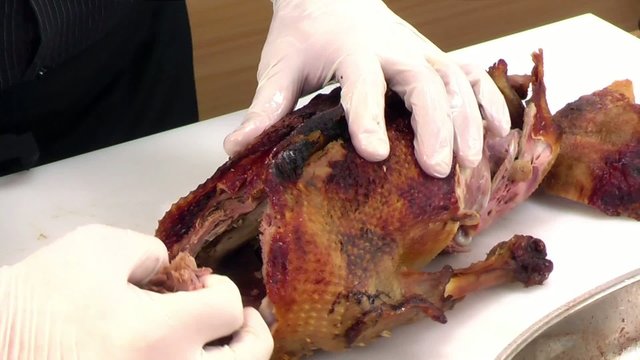 cutting roast goose