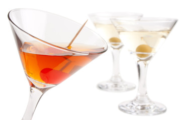 Sweet martini cocktail and two dry martinis
