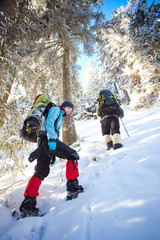 Hiker in winter mountains