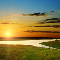 sunset over river