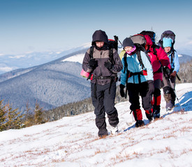 Hiker in winter mountains