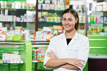 Pharmacy chemist woman in drugstore