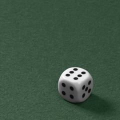 die on green felt