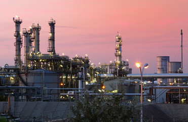 Oil refinery at sunset