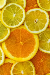 Fototapete Obstscheiben Orangen- und Zitronenscheiben