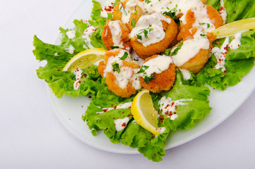 Ceasar salad served in the plate