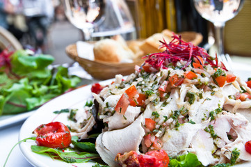 Fresh chicken salad and tomatoes