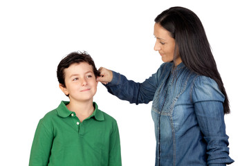 Mother pulling her child's ear for being naughty