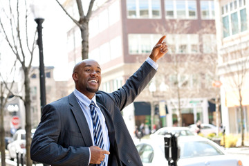 Business Man Hails a Taxi
