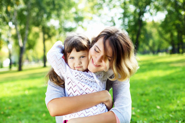 Fototapeta premium Mother and daughter in park