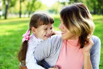 Mother and daughter in park
