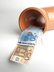 Rohr mit Geld