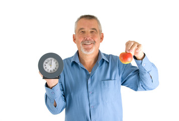 Mann mit Uhr und Apfel