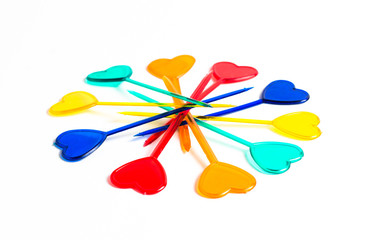Set of multi-colored sticks for a canape on a white background