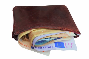 Euro bills in a brown wallet isolated on white background