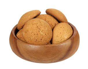 oatmeal cookies in wooden bowl on white background