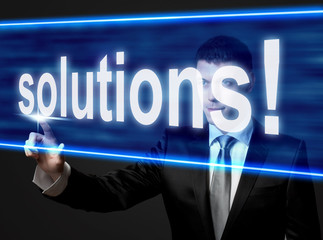 solutions - businessman touching blue screen