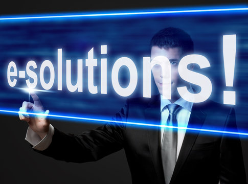 e-solutions - businessman touching blue screen