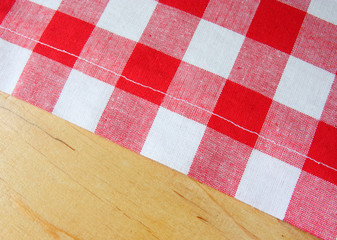 red white towel on wooden table