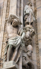 Fototapeta premium Sculptures on the cathedral in Milan, Italy