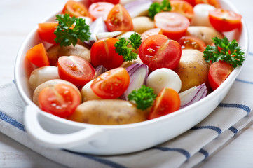 Fresh vegetables in a white dish