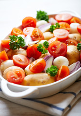 Fresh vegetables in a white dish