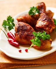 Roasted chicken legs on a plate