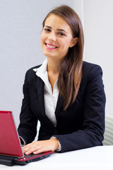 businesswoman browsing internet at office