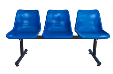 Blue plastic chairs at the bus stop