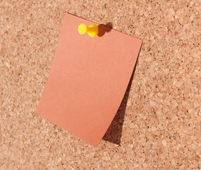 Blanked note paper on a bulletin board