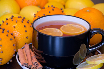 Warm drink with orange and lemon