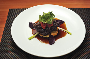 gourmet beef meal with roasted leeks and beets