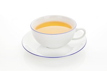 Teacup with green tea isolated.