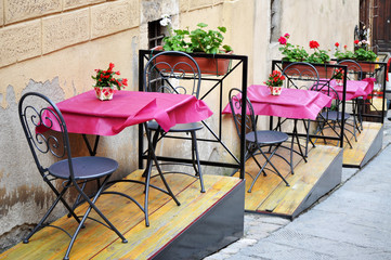 Empty Chairs at the Cafe