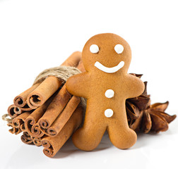 smiling gingerbread man with christmas spices