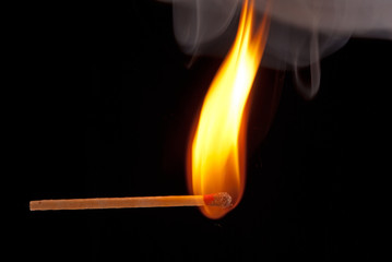 brennendes Streichholz