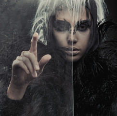 Mysterious woman pointing on something