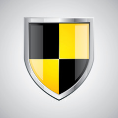 Fototapeta premium Glossy black and yellow shield