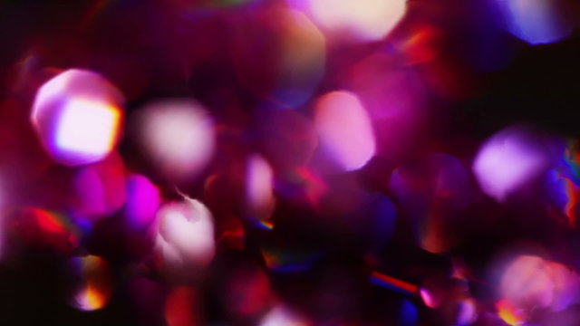 Abstract color bokeh circles background in violet tones