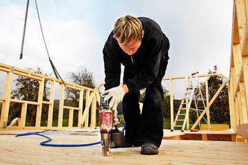 carpenters setting up prefabricated framework