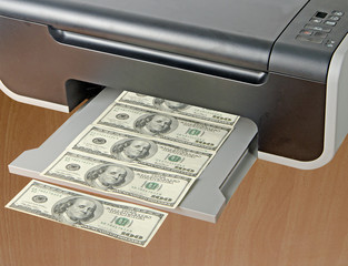 Printer printing fake dollar bills