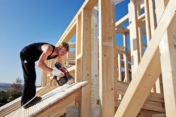 carpenters setting up prefabricated framework