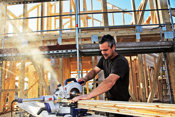 carpenters setting up prefabricated framework
