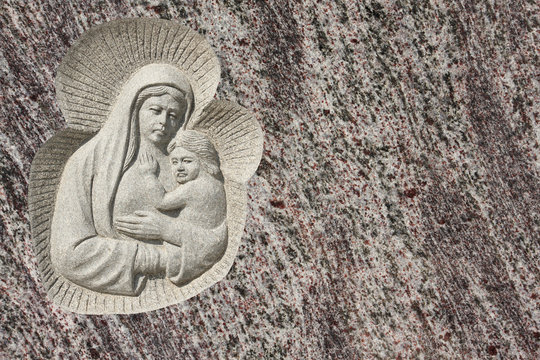 Stone carving of Virgin Mary and Jesus