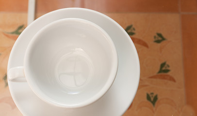 coffee  cup on the  glass table