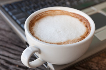 laptop  and coffee cup