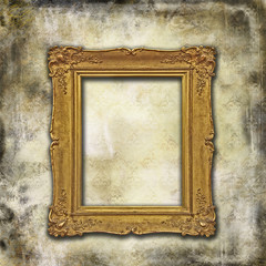 Golden antique frame on a grunge background