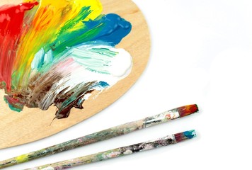 Paintbrushes and colors  on palet